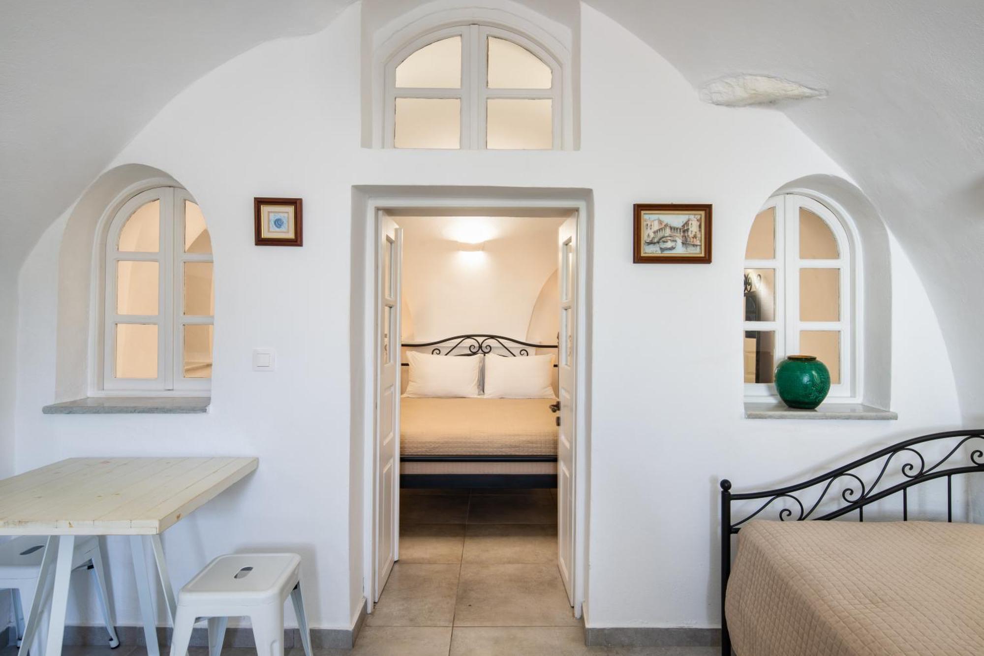 Apartamento Day One Fira Mansion Exterior foto